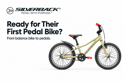 Pale olive Silverback Skid 20 kids bike with red grips beside the Ready for Their First Pedal Bike heading and Silverback logo on white.