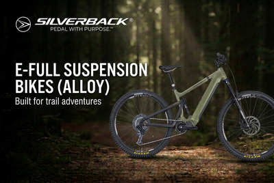 Khaki Silverback S-Electro Elite AL 2 alloy full-suspension electric mountain bike on a forest trail with alloy collection title and white Silverback logo