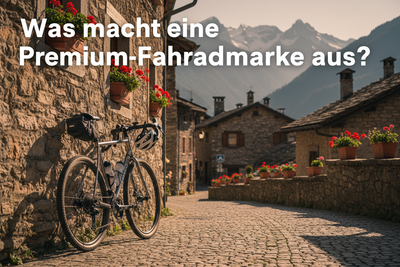 Silverback Gravelbike an einer Steinmauer in einem europäischen Bergdorf — Hero-Banner: Was macht eine Premium-Fahrradmarke aus?