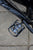 Xpedo Milo pedal mounted on a mountain bike – side view showing cage and cleat engagement