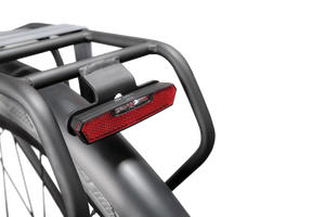 AXA Juno Dynamo Steady Rear Light for bicycles, showcasing compact design and side visibility.