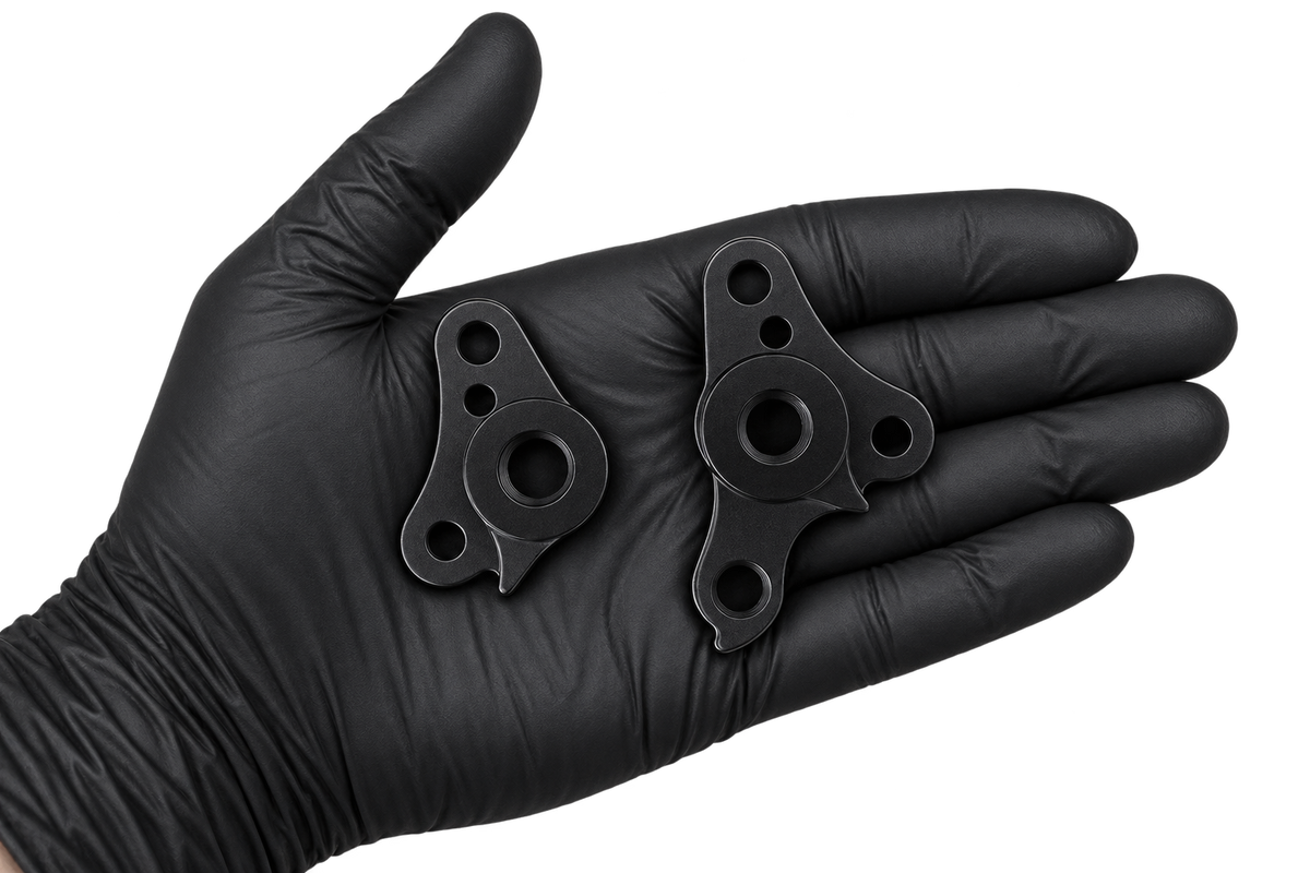 Both Hanger 14 parts in an open palm 3