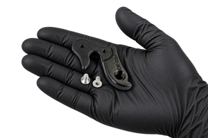 Hanger and screws in an open palm