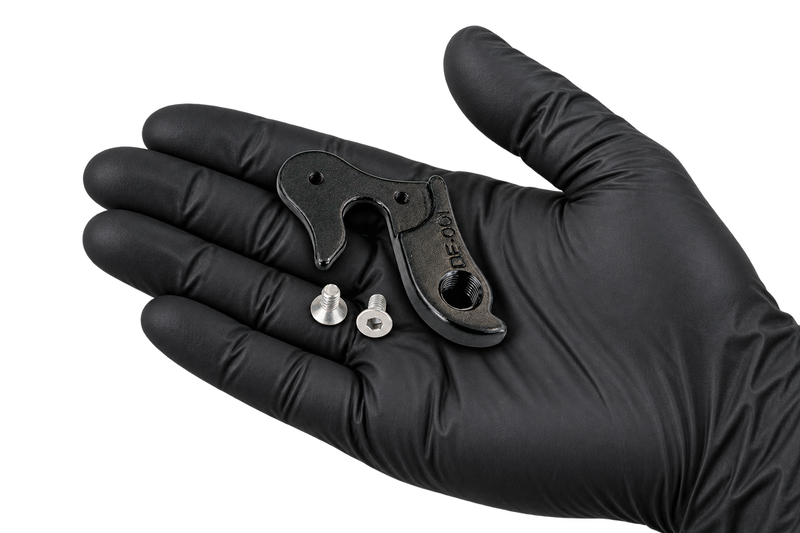 Hanger and screws in an open palm