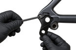  illustration of a mechanic fitting Hanger 21 with a hex key, installation not verified 4