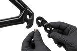 AI-generated servicing concept with gloved hands holding Hanger 3 beside a frame 2