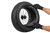 Illustration of gloved hands fitting a fatbike inner tube into a Vee Bulldozer tyre
