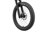 Illustration of a Maxxis Rekon+ tyre fitted to a mountain bike front wheel 3