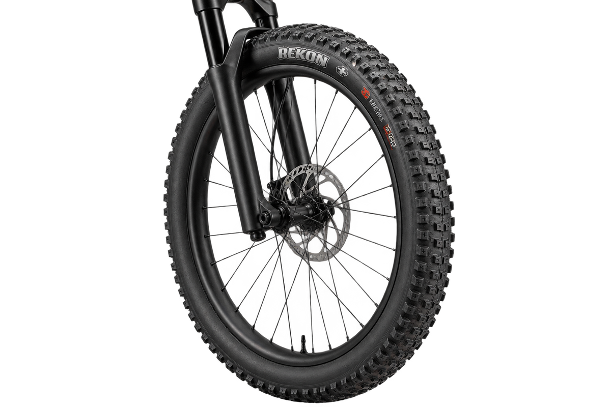 Illustration of a Maxxis Rekon+ tyre fitted to a mountain bike front wheel 3