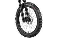 Illustration of a Maxxis Rekon+ tyre fitted to a mountain bike front wheel 3