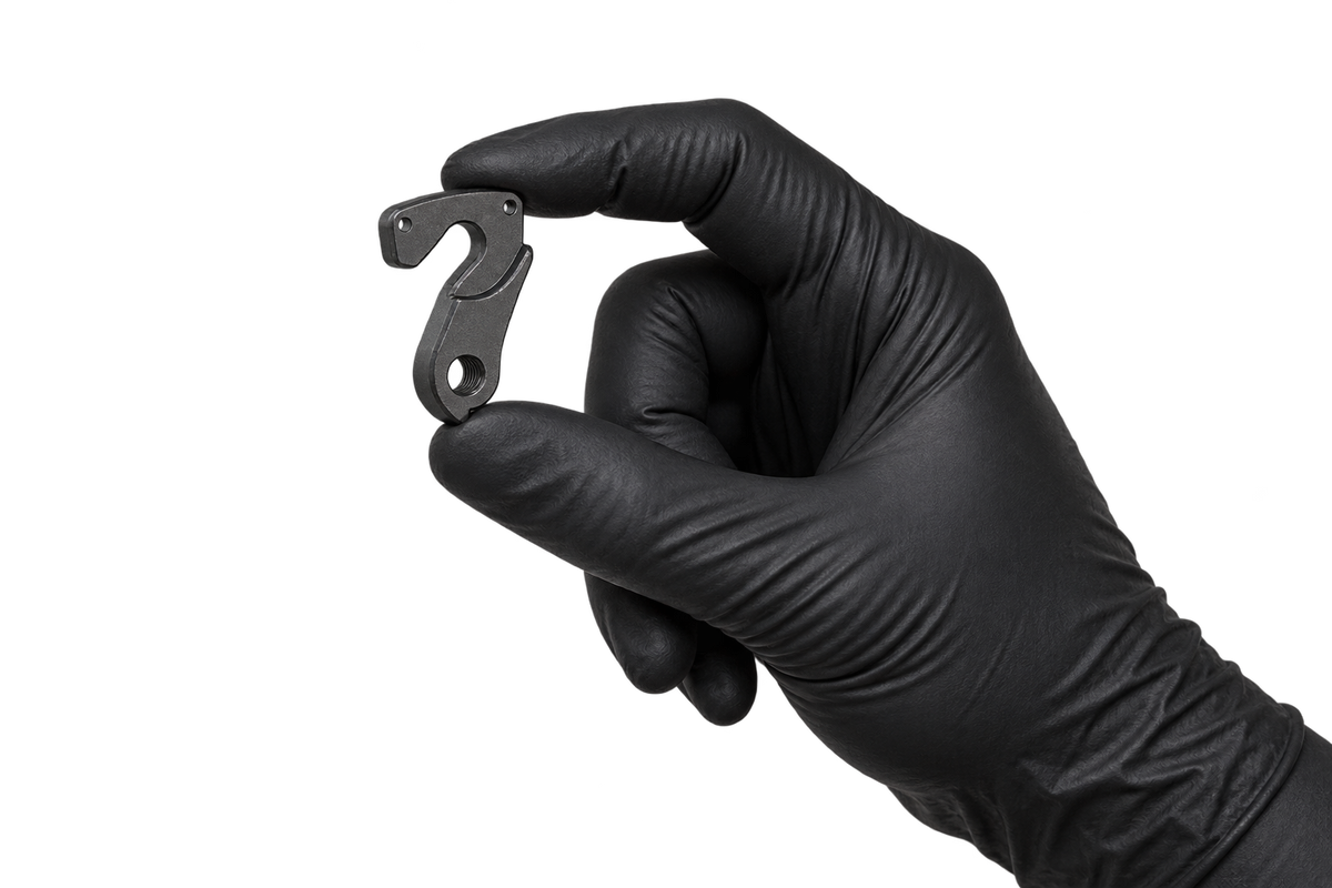 Small Hanger 15 held between fingertips 3