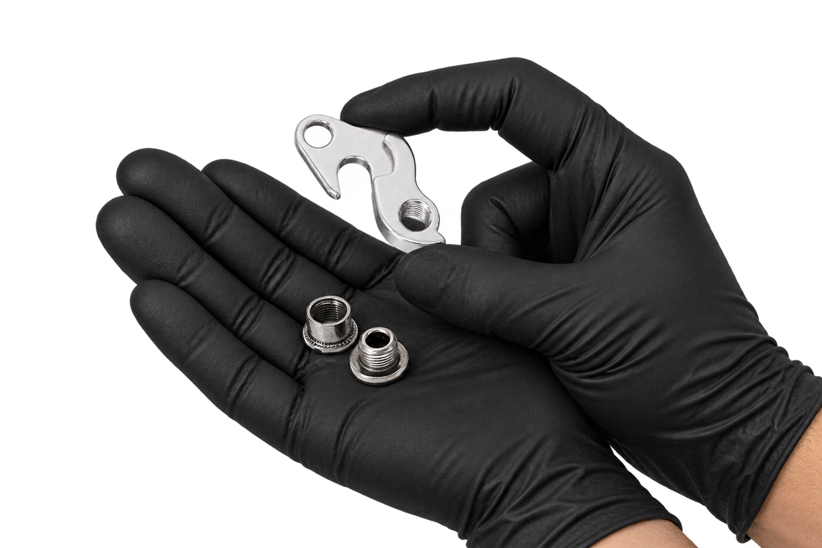 Small Hanger 16 held between fingertips 3