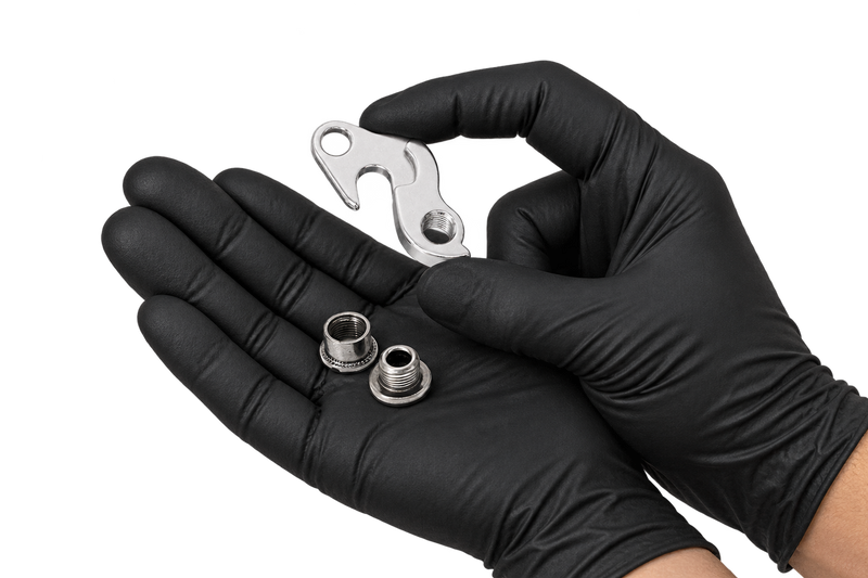 Small Hanger 16 held between fingertips