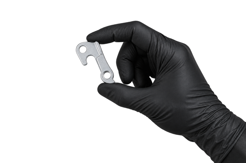Small Hanger 17 held between fingertips