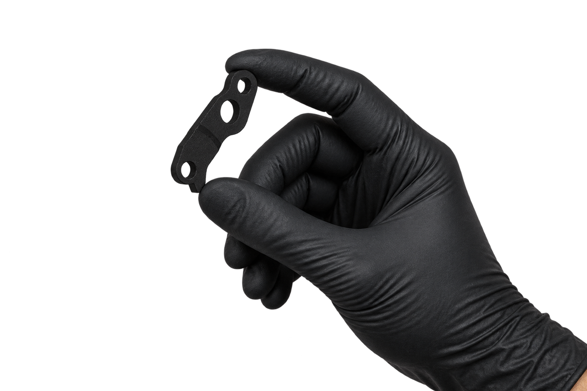 Small Hanger 26 held between fingertips 3