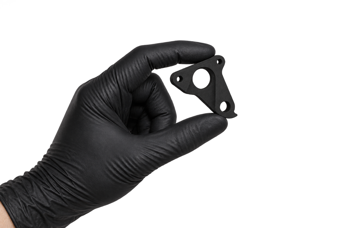 Small Hanger 27 held between fingertips 1