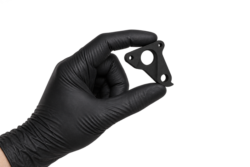 Small Hanger 27 held between fingertips