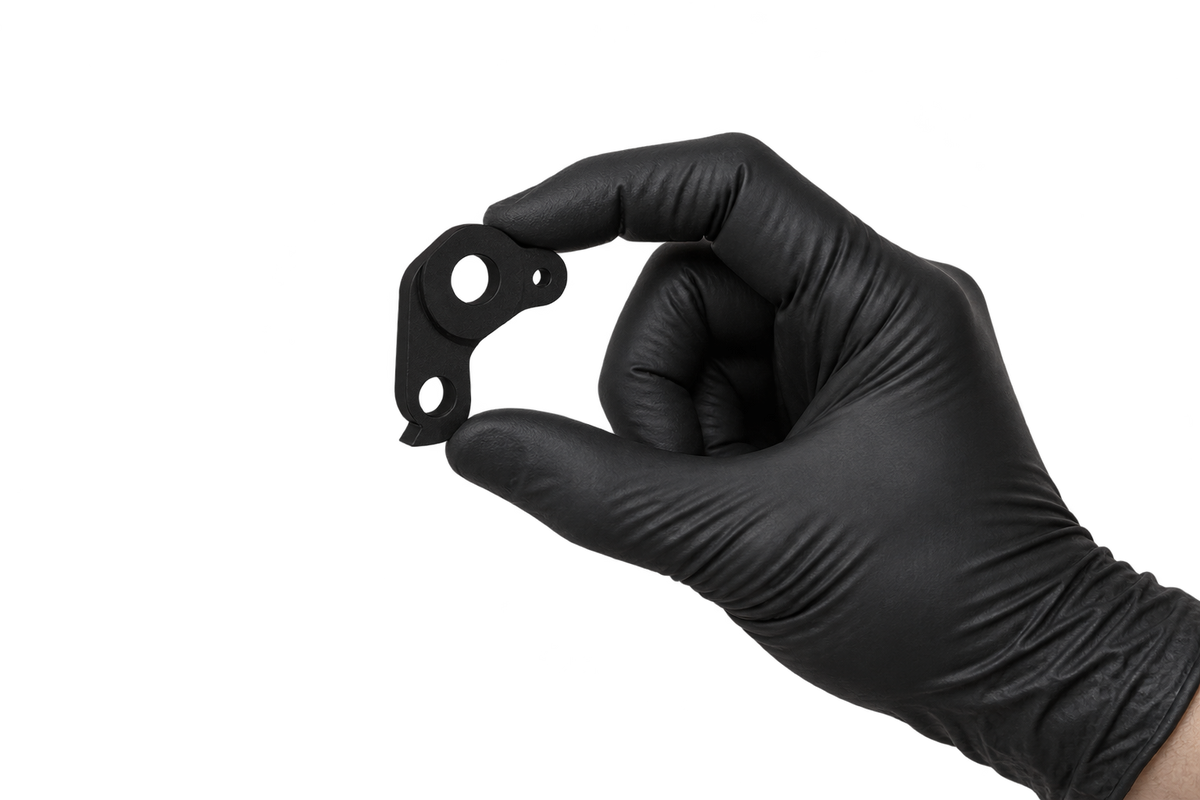 Small Hanger 28 held between fingertips 2