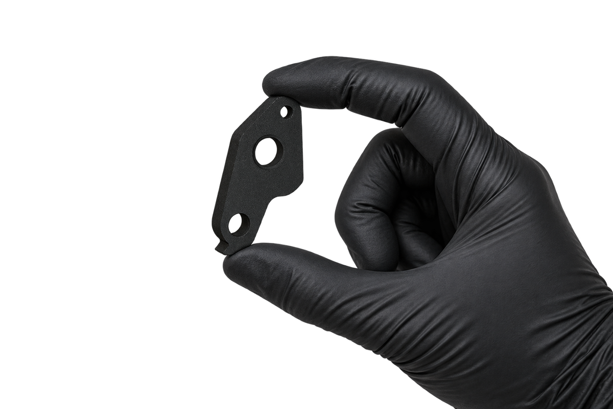 Small Hanger 29 held between fingertips 1