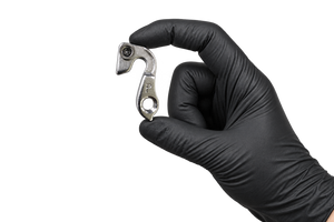 Small Hanger 32 held between fingertips