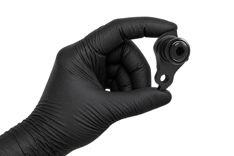 Small Hanger 33 held between fingertips