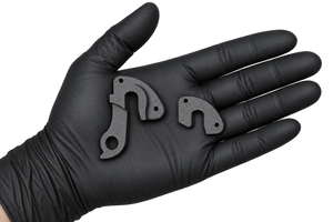 Small Hanger 34 components in an open palm