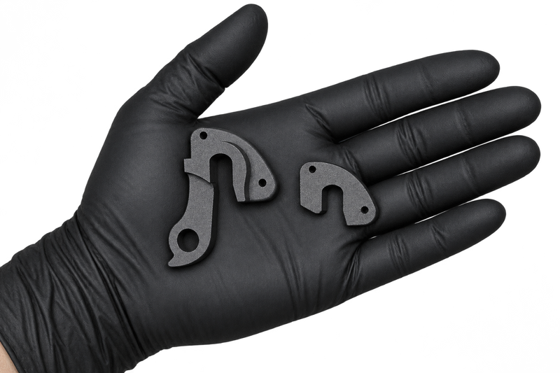 Small Hanger 34 components in an open palm