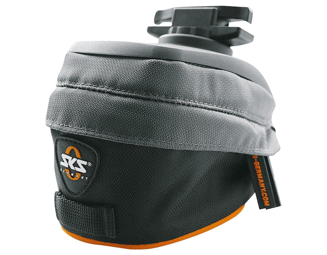 SKS Race Bag Small Saddlebag attached to a bicycle, showcasing its sleek design and reflective strips.