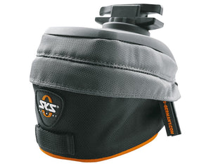 SKS Race Bag Small Saddlebag attached to a bicycle, showcasing its sleek design and reflective strips.