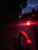 Lifestyle shot of Spectrum Rear Light 2 mounted on a bicycle during nighttime